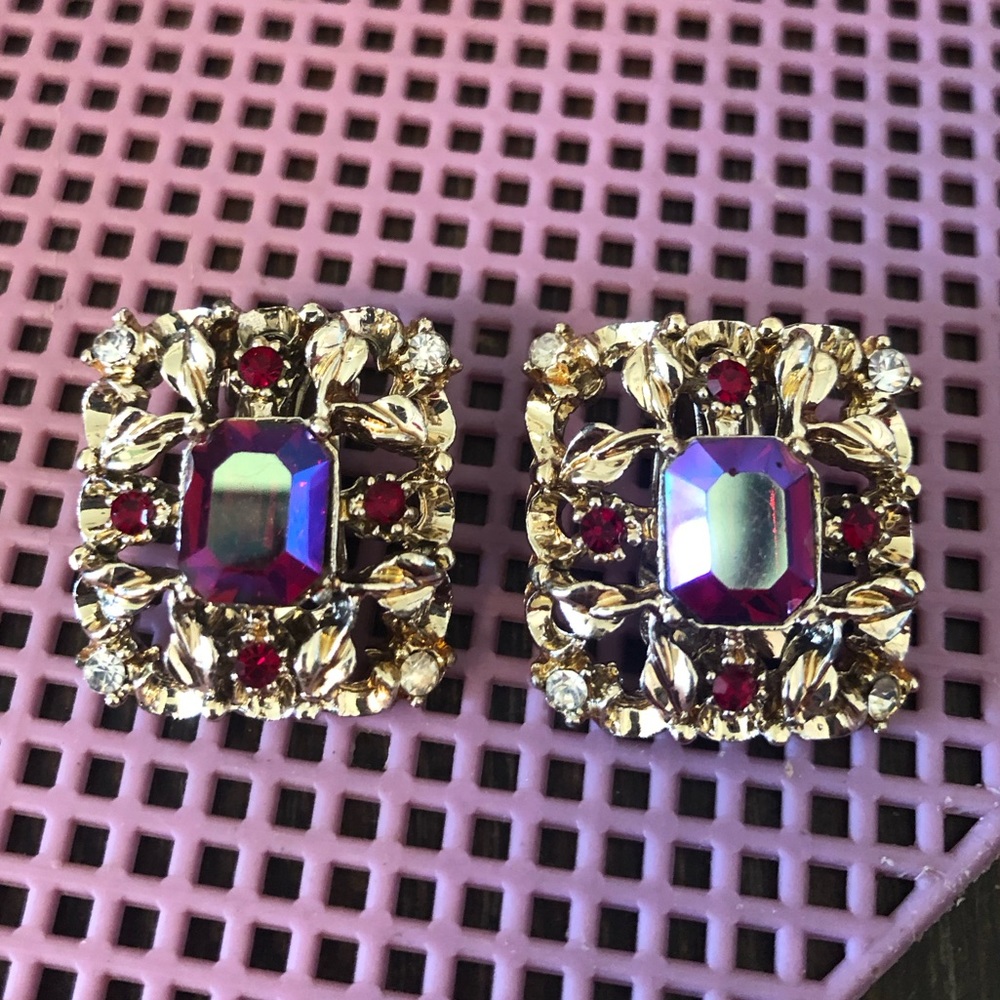 Coro gold w/red rhinestones. clip earrings.
